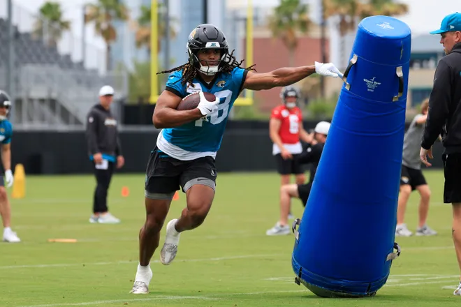 Jacksonville Jaguars tight end Ethan Conner (48) hits a blocking pad during rookie minicamp at the Miller Electric Center, Saturday, May 9, 2026 in Jacksonville, Fla. Today was the second of a three day camp concluding Sunday.