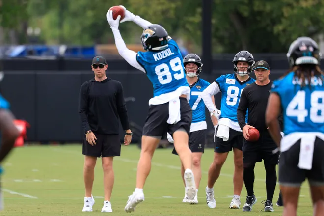 Jacksonville Jaguars tight end Tanner Koziol (89) catches a pass from head coach Liam Coen during rookie minicamp at the Miller Electric Center, Saturday, May 9, 2026 in Jacksonville, Fla. Today was the second of a three day camp concluding Sunday.