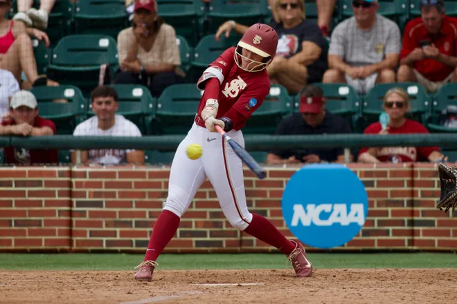 Florida State softball’s Shelby Mackenzie drives a hit to the outfield against Jacksonville State in the NCAA Tallahassee regional on Saturday, May 16, 2026.