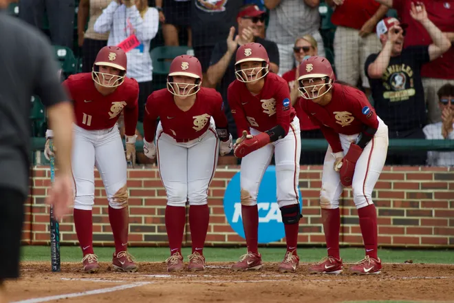 FSU softball players celebrate Jaysoni Beachum’s grand slam against Stetson on Saturday, May 16, 2026 in the NCAA Tallahassee regional.