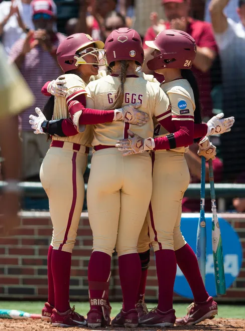 Florida State Seminoles infielder Hayley Griggs (1) and her teammates celebrate her home run. The Florida State Seminoles defeated the UCF Knights 2-1 on Sunday, May 17, 2026. The teams must play one more game to determine the NCAA Tallahassee regional winner.