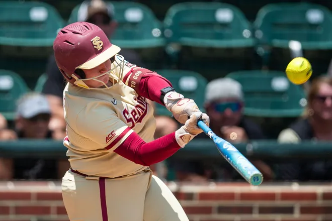 Florida State Seminoles catcher Anna Hinde (77) swings at the pitch. The Florida State Seminoles defeated the UCF Knights 2-1 on Sunday, May 17, 2026. The teams must play one more game to determine the NCAA Tallahassee regional winner.