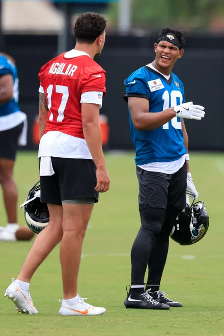 Jacksonville Jaguars quarterback Joey Aguilar (17) and wide receiver CJ Williams (18) talk during rookie minicamp at the Miller Electric Center, Saturday, May 9, 2026 in Jacksonville, Fla. Today was the second of a three day camp concluding Sunday.