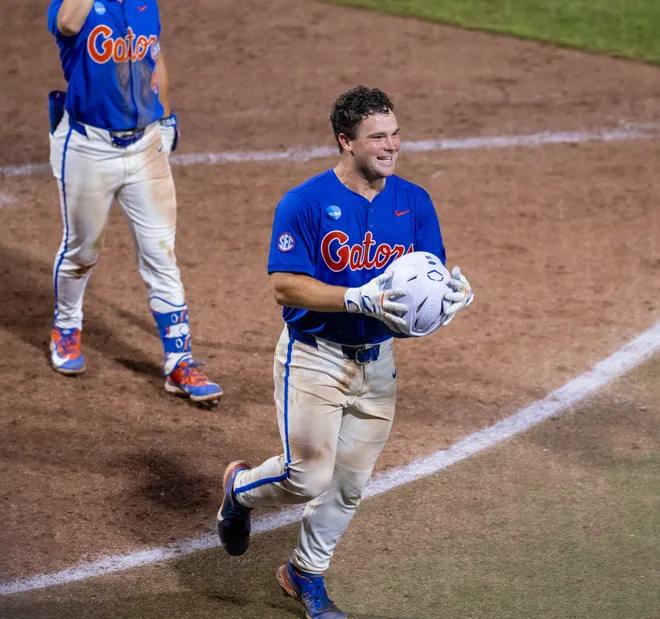 Florida's Karson Bowen (14) with the fourth home run of the inning against Miami in the eighth in NCAA Gainesville Regionals at Condron Family Ballpark in Gainesville, Florida, Saturday, May 30, 2026. The Gators beat the Hurricanes 22-10. [Cyndi Chambers/ Gainesville Sun] 2026