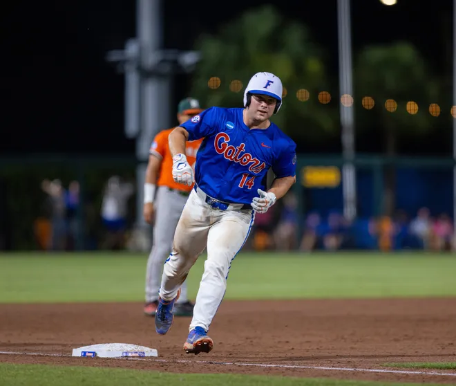 Florida's Karson Bowen (14)] with a line drive homer in the bottom of the third against Miami in NCAA Gainesville Regionals at Condron Family Ballpark in Gainesville, Florida, Saturday, May 30, 2026. The Gators beat the Hurricanes 22-10. [Cyndi Chambers/ Gainesville Sun] 2026