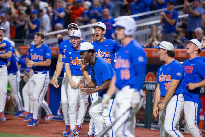 The Florida dugout reacts to Cade KurlandÃ•s (4) three run homer in the bottom of the first against Miami in NCAA Gainesville Regionals at Condron Family Ballpark in Gainesville, Florida, Saturday, May 30, 2026. The Gators beat the Hurricanes 22-10. [Cyndi Chambers/ Gainesville Sun] 2026