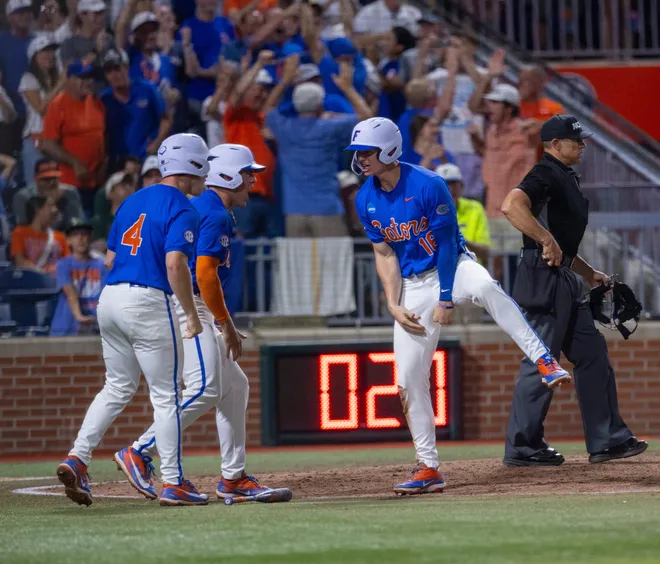Florida's Hayden Yost (16) is safe at home in the bottom of the sixth against Miami in NCAA Gainesville Regionals at Condron Family Ballpark in Gainesville, Florida, Saturday, May 30, 2026. The Gators beat the Hurricanes 22-10. [Cyndi Chambers/ Gainesville Sun] 2026
