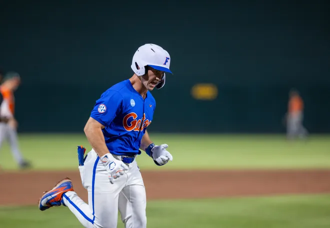 Florida's Cade Kurland (4) with a three run homer in the bottom of the first against Miami in NCAA Gainesville Regionals at Condron Family Ballpark in Gainesville, Florida, Saturday, May 30, 2026. The Gators beat the Hurricanes 22-10. [Cyndi Chambers/ Gainesville Sun] 2026