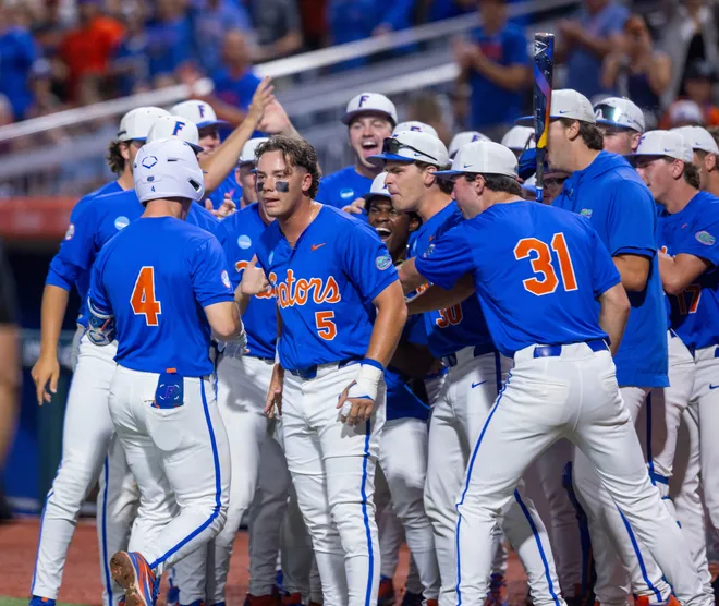 Florida's Cade Kurland (4) with a three run homer in the bottom of the first against Miami in NCAA Gainesville Regionals at Condron Family Ballpark in Gainesville, Florida, Saturday, May 30, 2026. The Gators beat the Hurricanes 22-10. [Cyndi Chambers/ Gainesville Sun] 2026