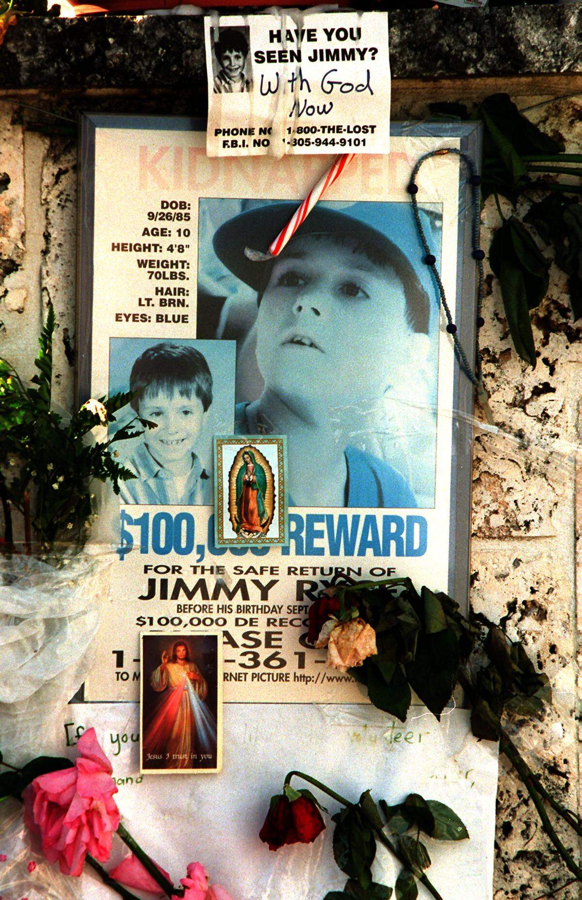 Poster and flowers outside the home ofJimmy Ryce in 1995.