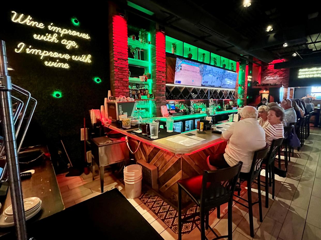 The bar at Two Meatballs in the Kitchen in Cape Coral fills quickly during happy hour.