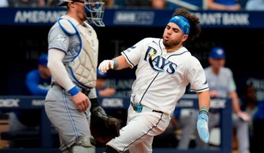 Tampa Bay Rays' Jonathan Aranda, right, scores in front of Toronto Blue Jays catcher Tyler Heineman on an RBI double by Jonny DeLuca during the fourth inning of a baseball game Wednesday, May 6, 2026, in St. Petersburg, Fla. (AP Photo/Chris O'Meara)