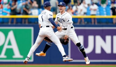 Tampa Bay Rays second baseman Richie Palacios (1) and shortstop Taylor Walls celebrate after the team defeated the Baltimore Orioles during a baseball game Wednesday, May 20, 2026, in St. Petersburg, Fla. (AP Photo/Chris O'Meara)