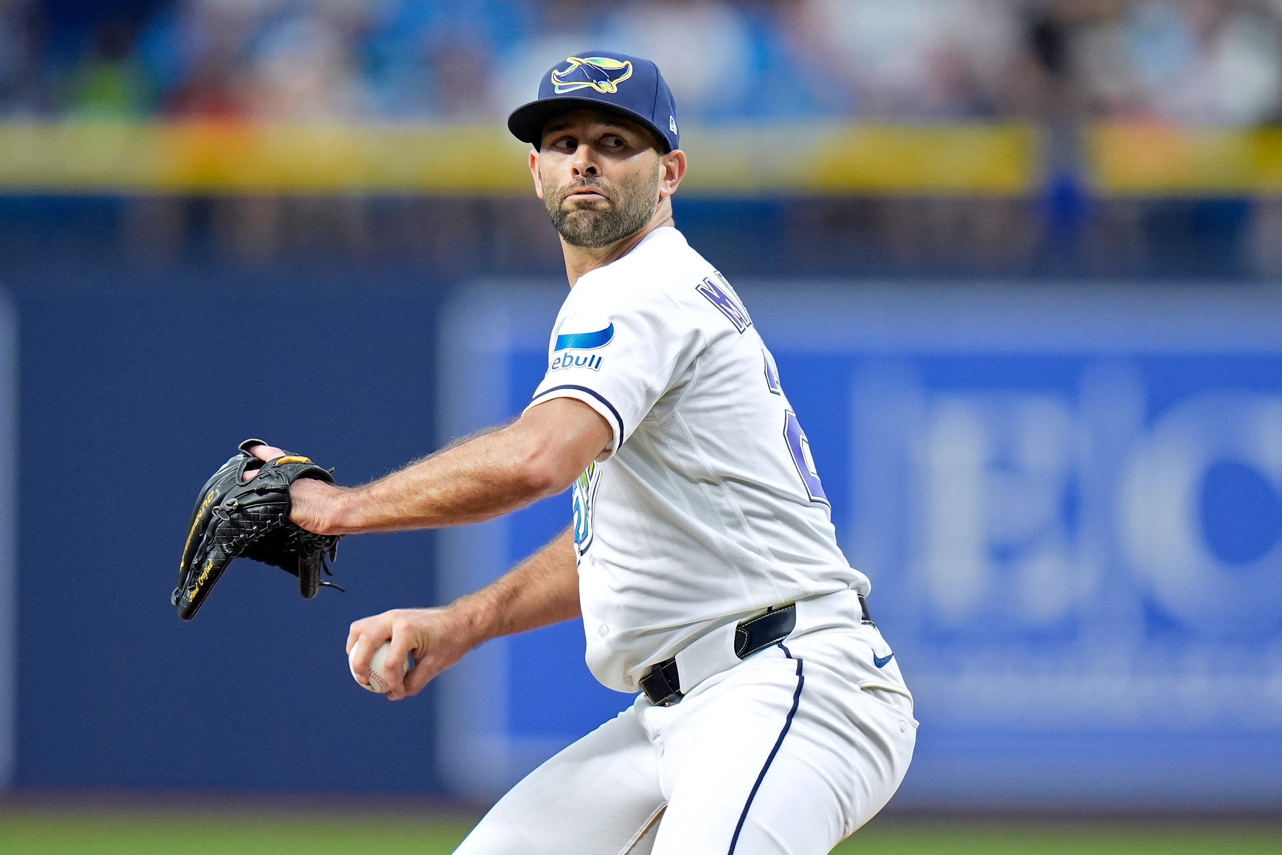 Tampa Bay Rays starting pitcher Nick Martinez throws to the...