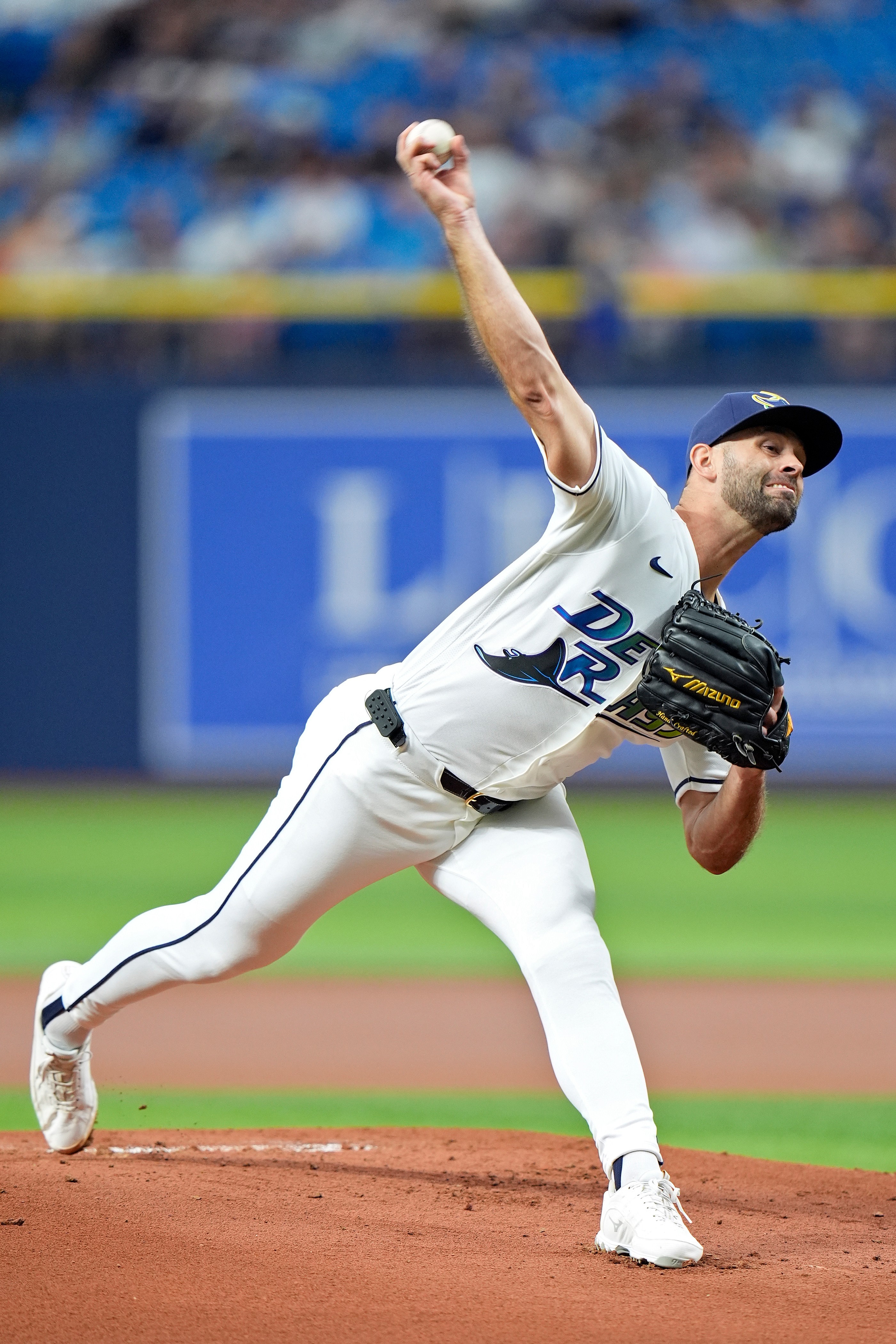 Tampa Bay Rays starting pitcher Nick Martinez throws to the...