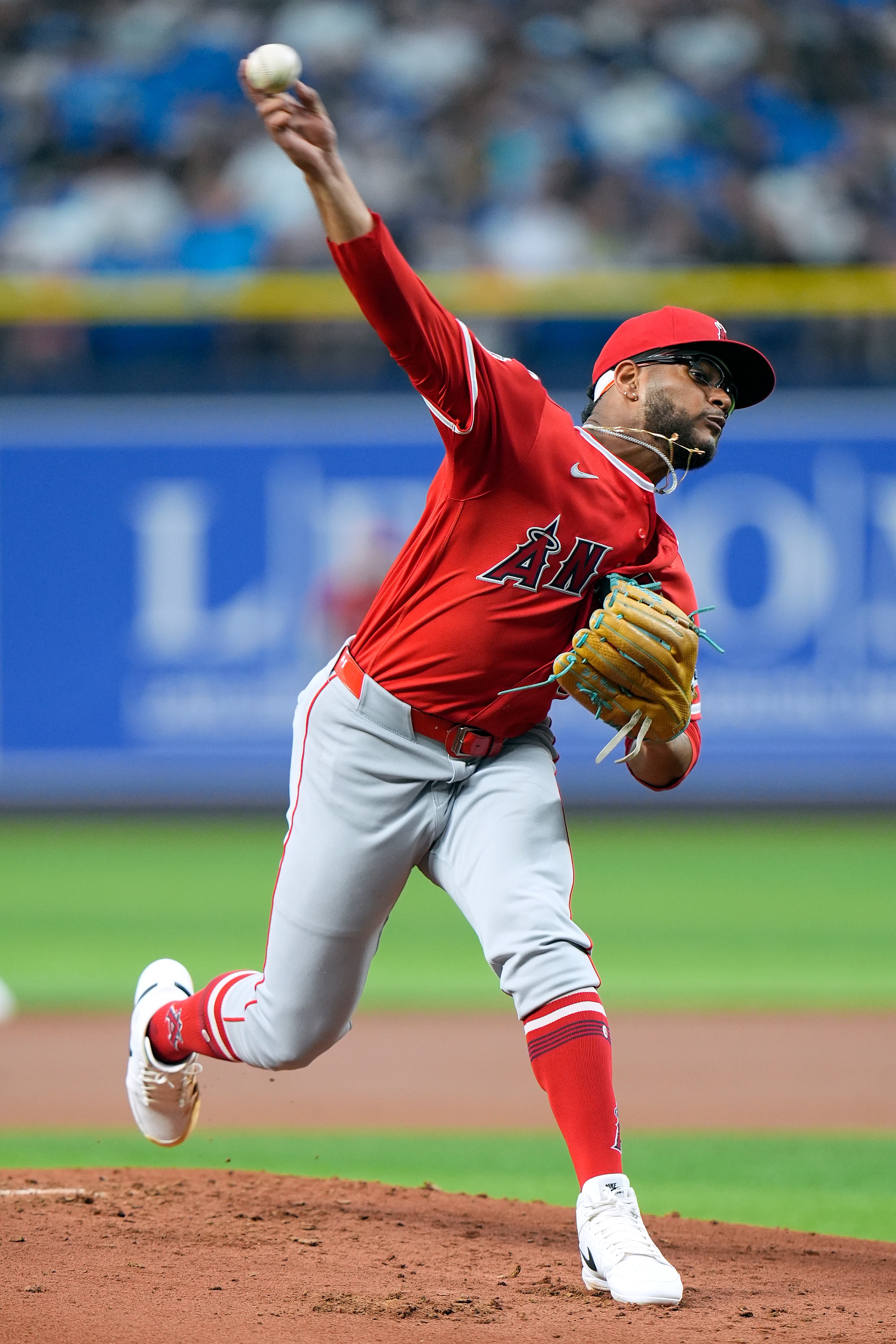 Angels starting pitcher Walbert Ureña throws to the plate during...
