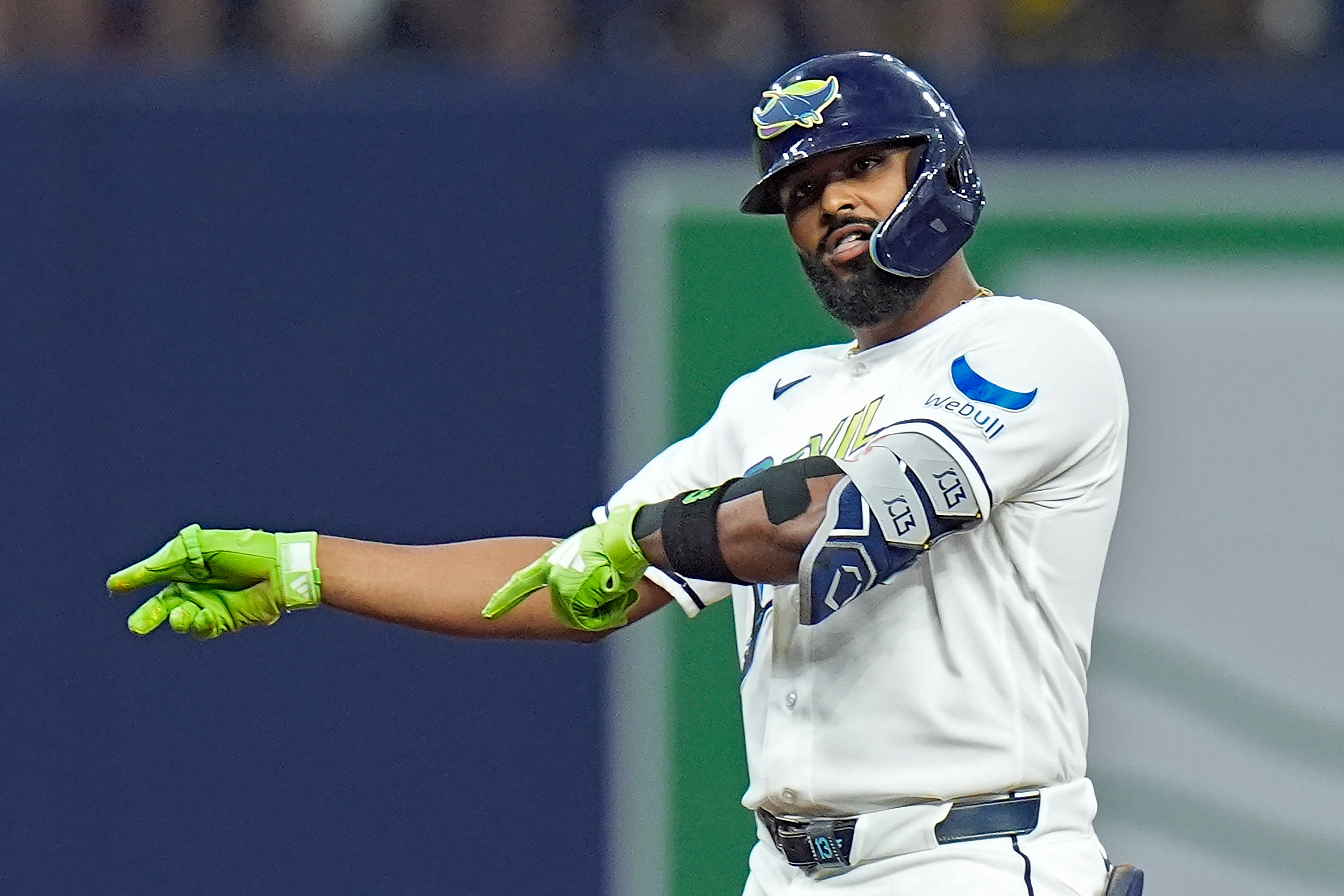 The Tampa Bay Rays’ Junior Caminero gestures after hitting a...