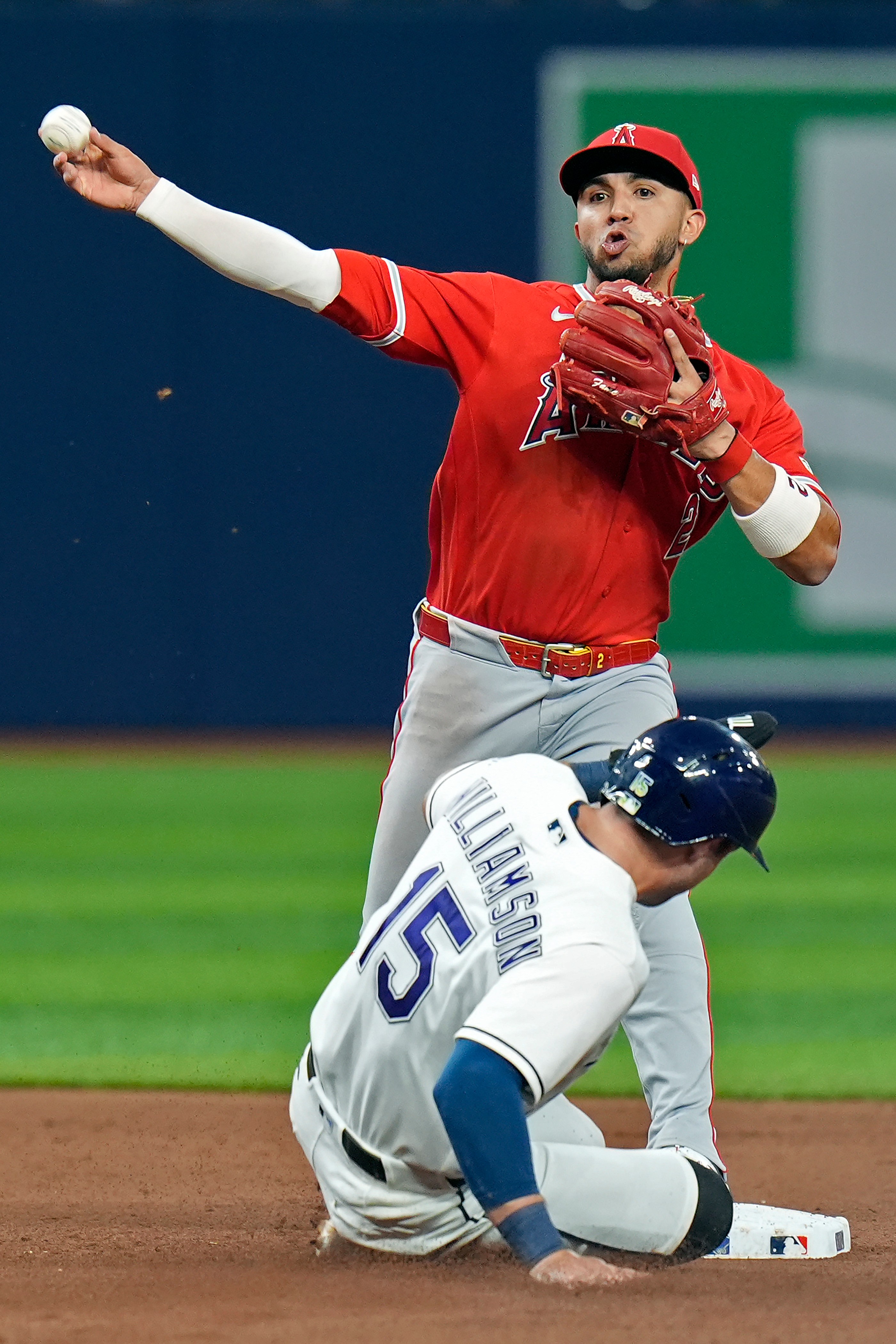 Angels second baseman Oswald Peraza forces out the Tampa Bay...