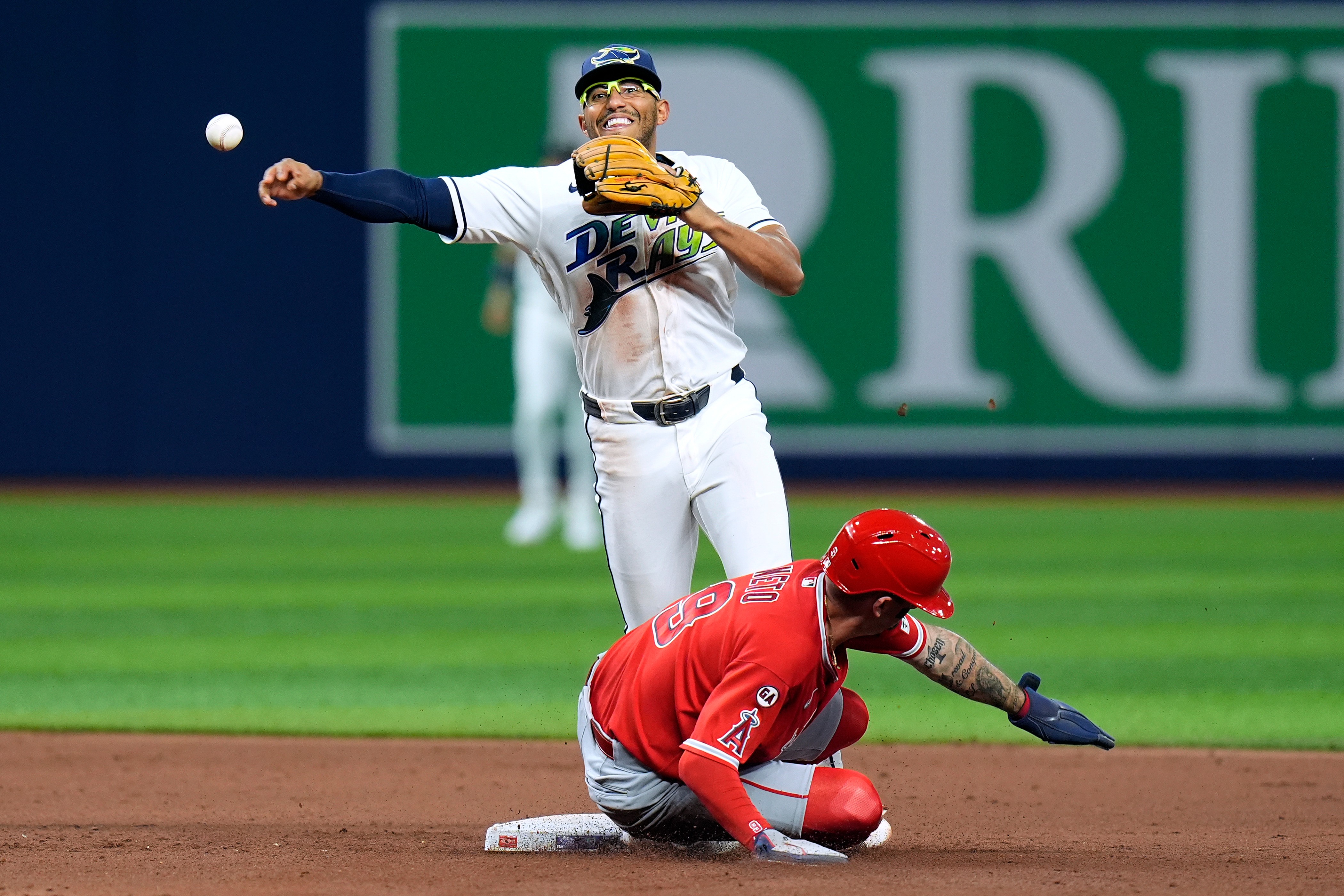 Tampa Bay Rays second baseman Richie Palacios forces out the...