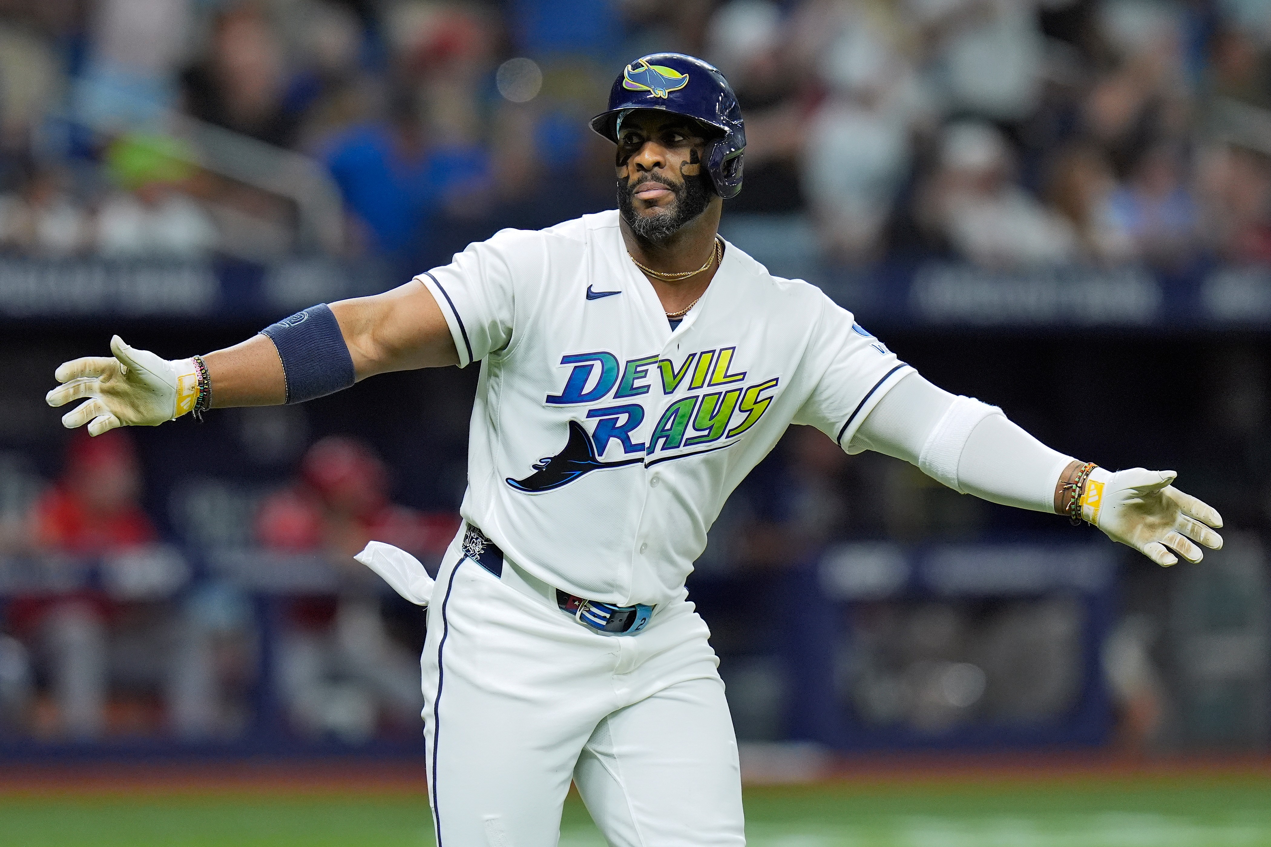 The Tampa Bay Rays’ Yandy DÃaz celebrates after hitting a...