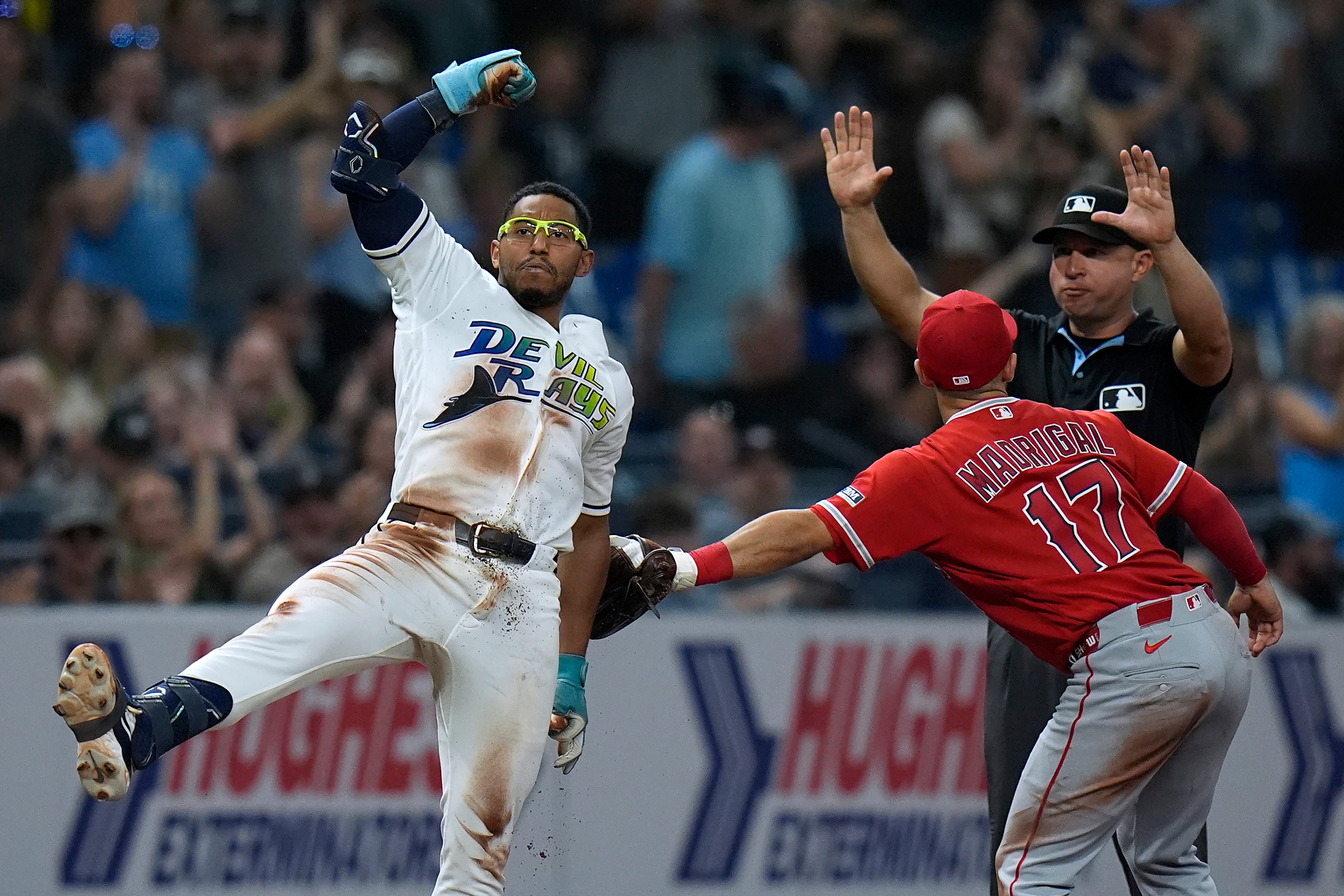 The Tampa Bay Rays’ Richie Palacios, left, celebrates after hitting...