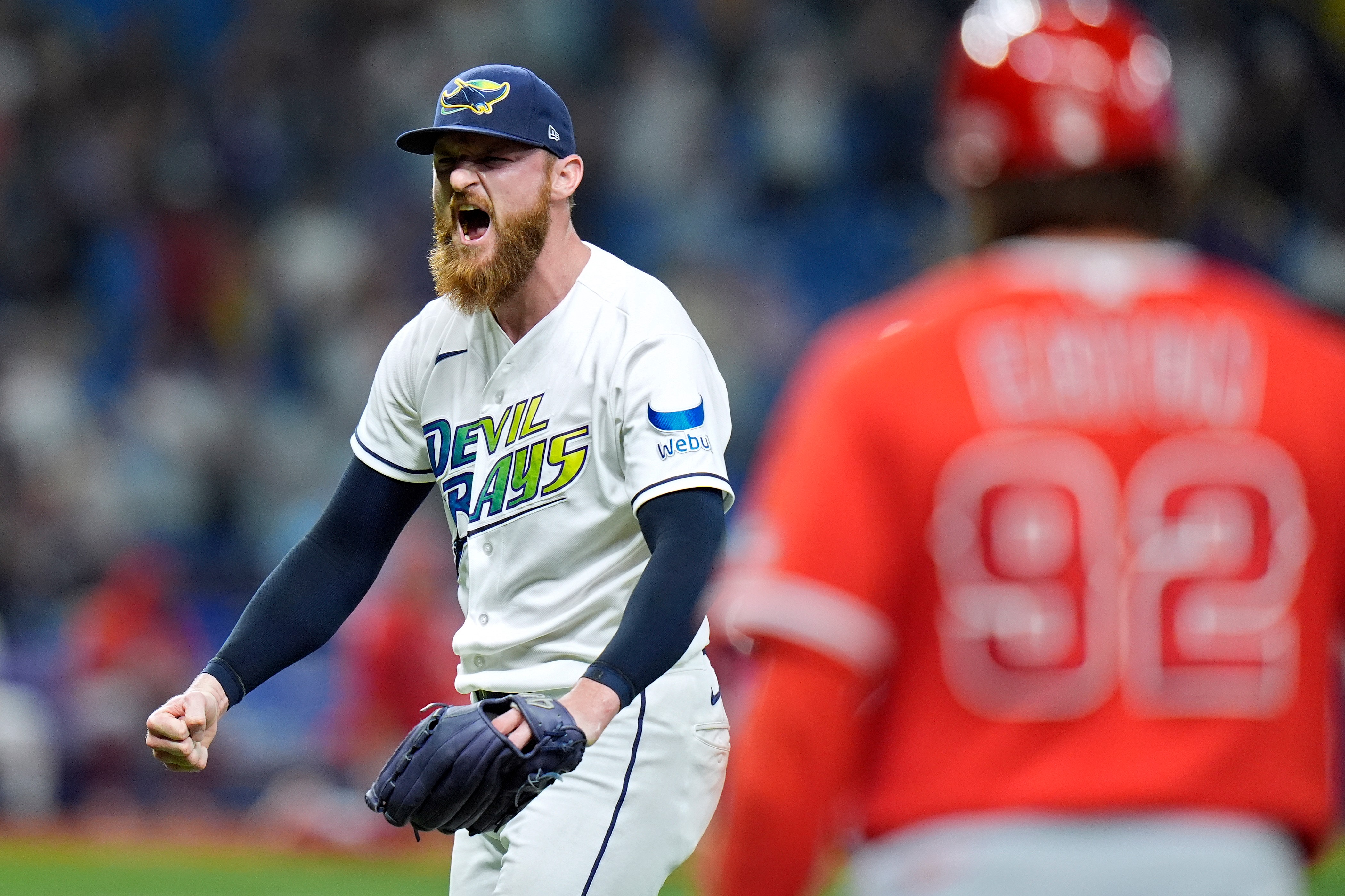 Tampa Bay Rays relief pitcher Bryan Baker celebrates after the...