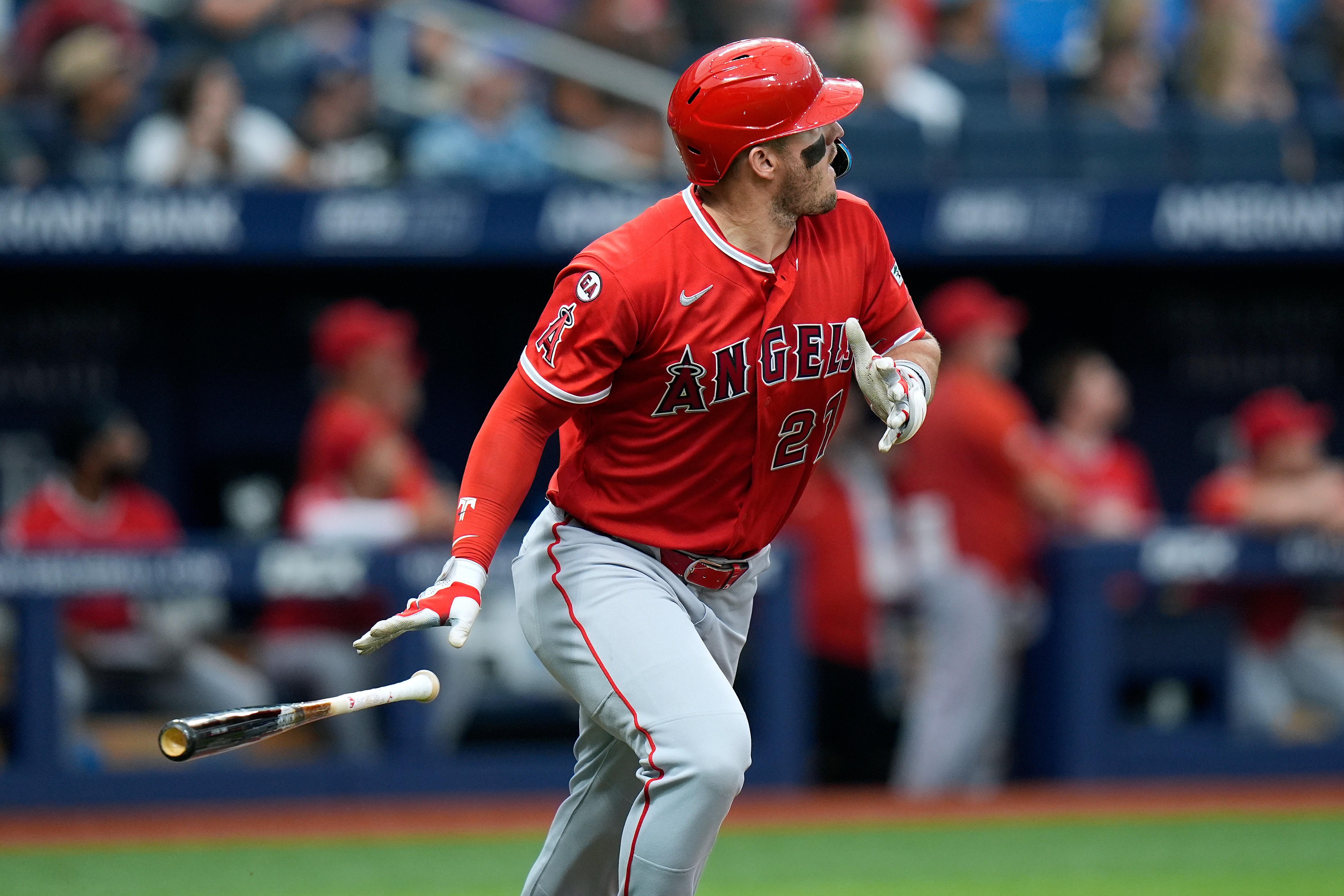 Angels’ Mike Trout (27) watches his home run off Tampa...