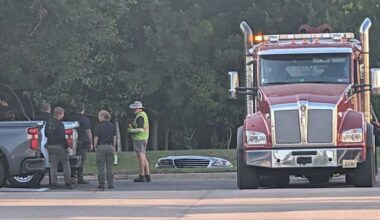Vehicle found in retention pond near River City Marketplace