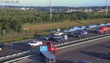 Semi-truck strikes guardrail, scatters debris across SR-417 in Orange County, troopers say