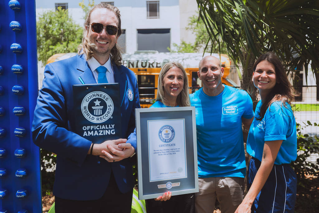 Chewy Receiving Guinness Certificate