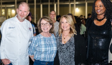 Christopher Bates (left) poses with guests at the March 3 Taste of Wekiva event at Wekiva High School.