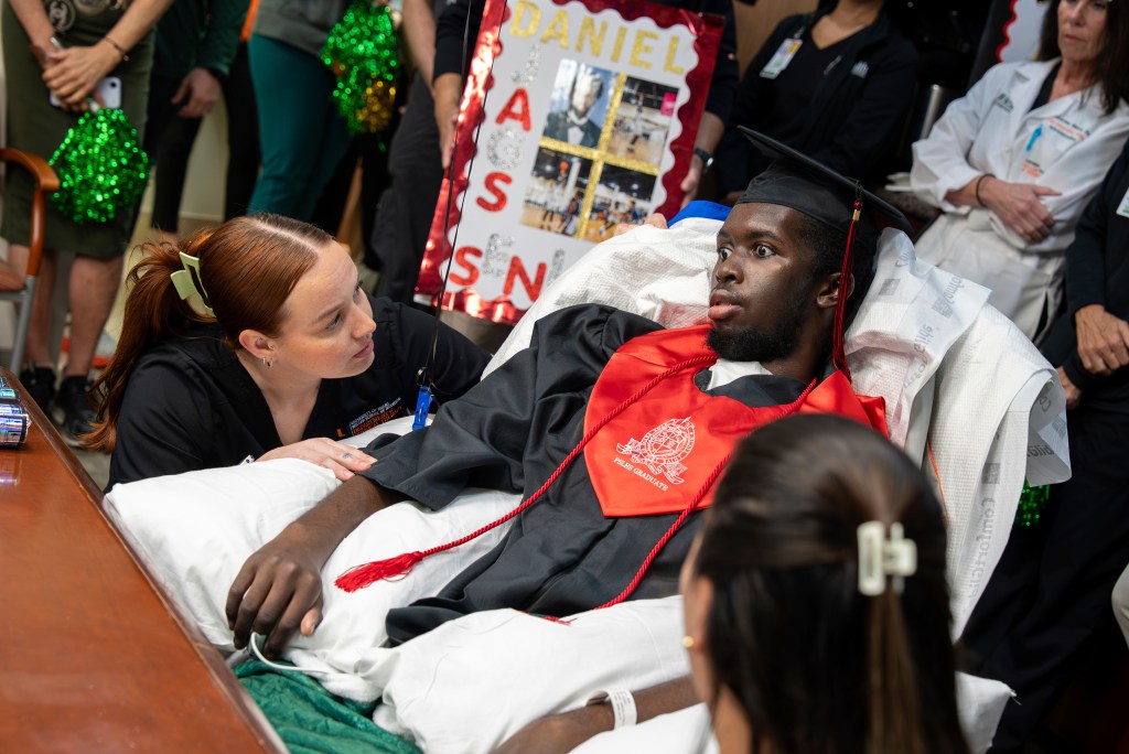 Teen basketball star graduates high school from his Miami hospital bed – Sun Sentinel