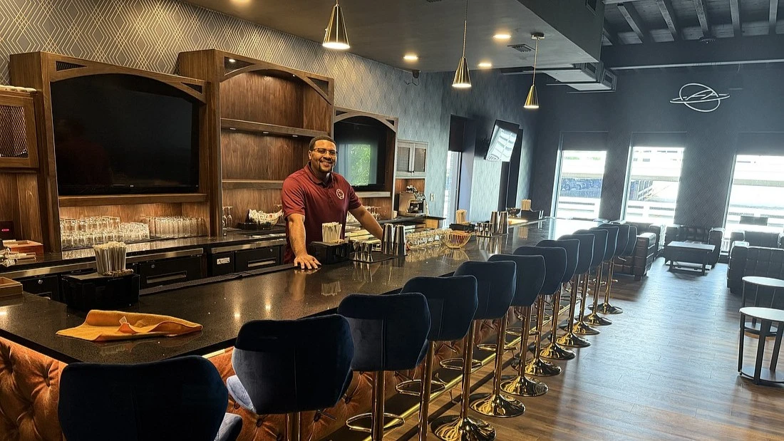 Darian “Jack” Jackson in the cigar bar he is opening.
