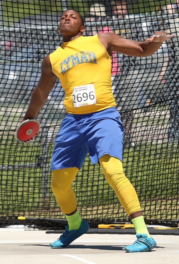 Adam Shuler, Lyman High, throws the discus during the FHSAA Track and Field Championships at the University of North Florida in Jacksonville on Saturday, May 2, 2015. (Stephen M. Dowell/Orlando Sentinel)