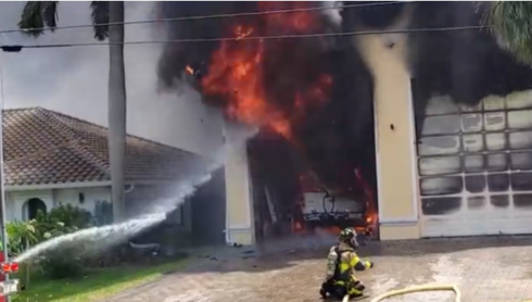 Fire tears through home's garage in Cape Coral