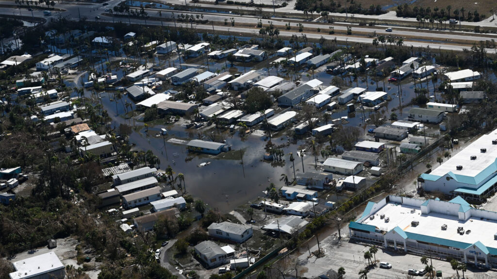 Flooding and damage in Lee County from Hurricane Ian (U.S. Coast Guard photo by Petty Officer Third Class Riley Perkofski, CC BY-NC-ND 2.0, edited for size, via flickr)