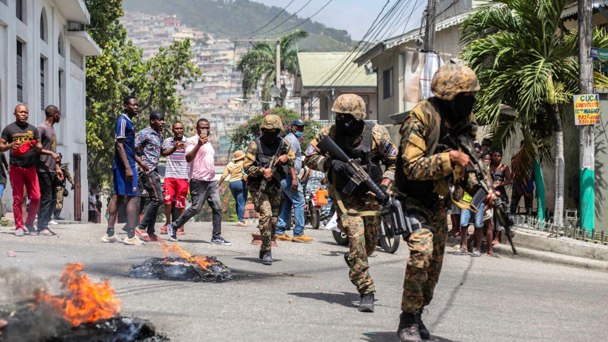 Citizens protesting near Petion Ville police station in Port-au-Prince