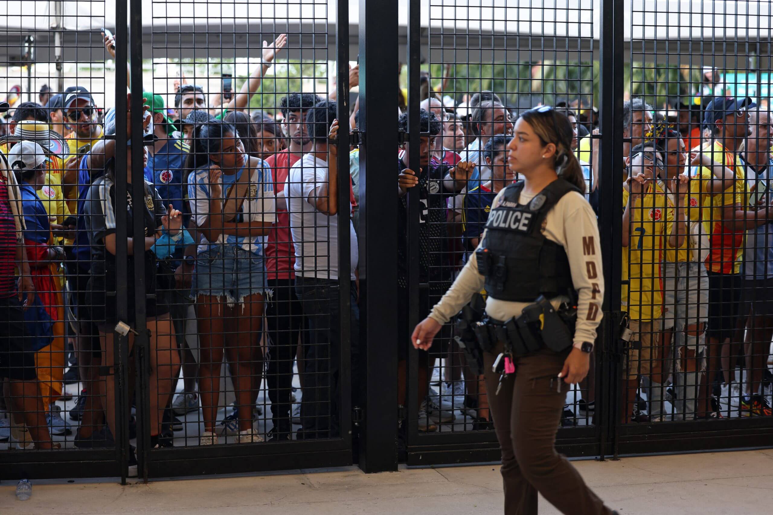 Supporters wait to be admitted into the Hard Rock Stadium at the final of the 2024 Copa America