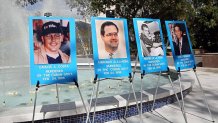 Photos of Brothers to the Rescue pilots Carlos Costa, Amando Alejandre Jr., Mario de la Peña and Pablo Morales displayed at Florida International University. The pilots were shot down in international water by Cuban Air Force MIG jet fighters on Feb. 24, 1996. (C.M. Guerrero/Miami Herald/Tribune News Service via Getty Images)