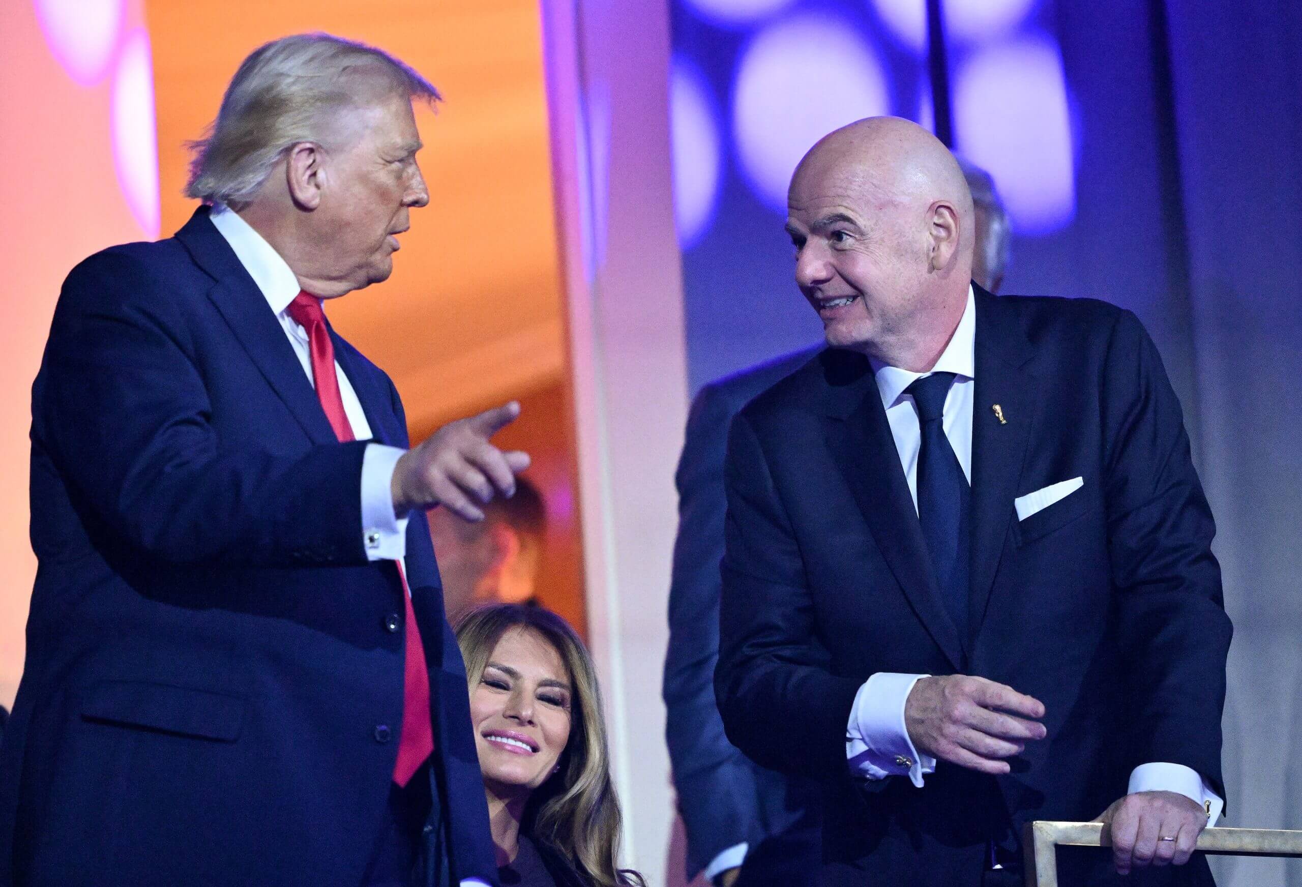 President Donald Trump speaks with FIFA's Gianni Infantino at the World Cup draw in December