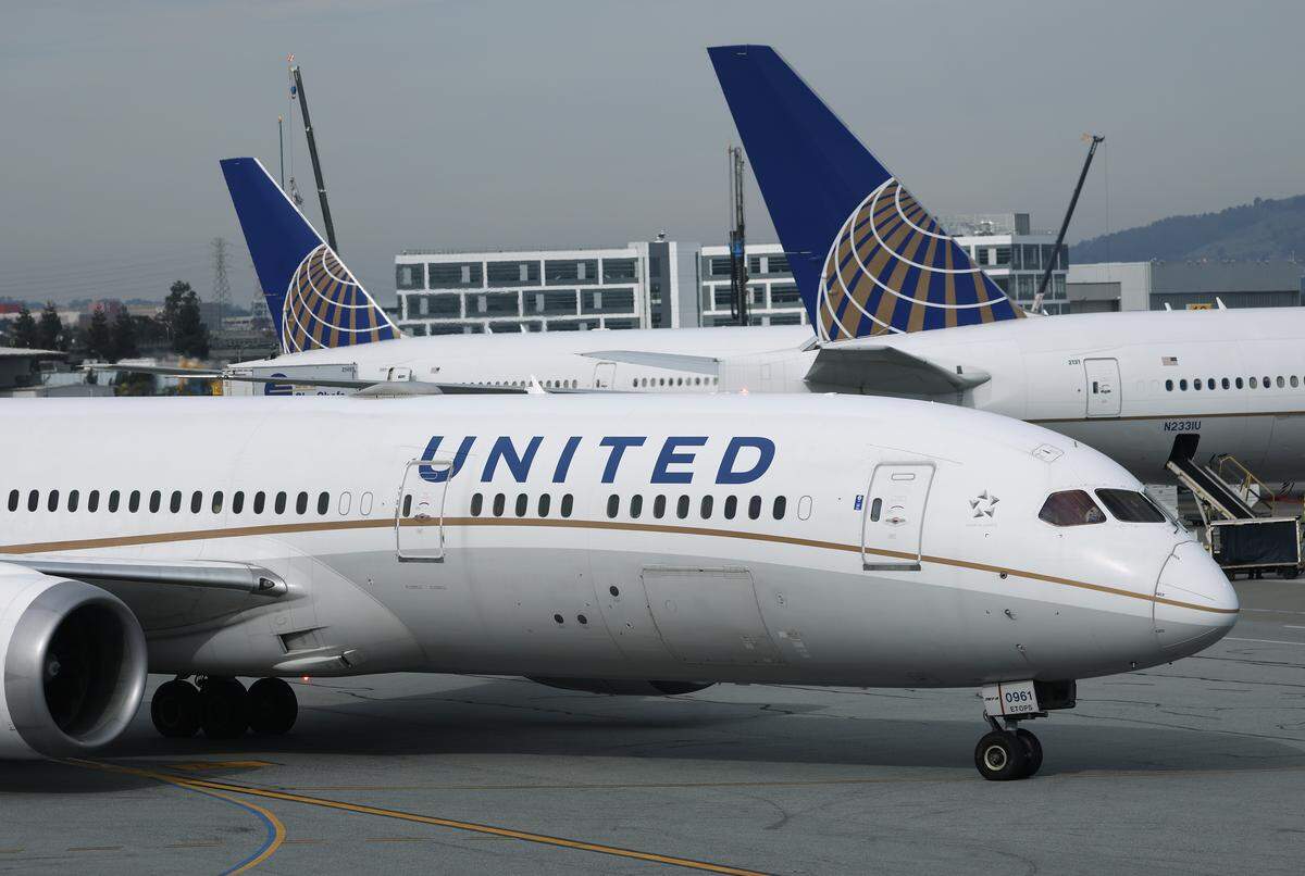 A United Airlines plane taxis at San Francisco International Airport.