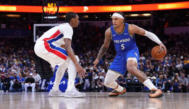 ORLANDO, FLORIDA - APRIL 06: Paolo Banchero #5 of the Orlando Magic dribbles the ball against Ausar Thompson #9 of the Detroit Pistons during the fourth quarter at Kia Center on April 06, 2026 in Orlando, Florida. NOTE TO USER: User expressly acknowledges and agrees that, by downloading and or using this photograph, User is consenting to the terms and conditions of the Getty Images License Agreement. (Photo by Rich Storry/Getty Images)