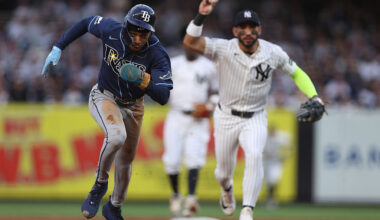 NEW YORK, NEW YORK - MAY 22: Chandler Simpson #14 of the Tampa Bay Rays runs while being chased by José Caballero #72 of the New York Yankees during the first inning at Yankee Stadium on May 22, 2026 in the Bronx borough of New York City. (Photo by Ishika Samant/Getty Images)