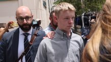 MIAMI, FLORIDA - MAY 27: Timothy Hudson, 16, leaves the James Lawrence King Federal Justice Building on May 27, 2026 in Miami, Florida. Hudson has been charged with first-degree murder and aggravated sexual abuse in the death of his stepsister Anna Kepner, 18, aboard a Carnival cruise ship. (Photo by Romain Maurice/Getty Images)