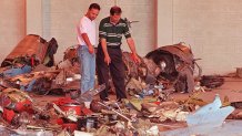 MIAMI, FL - MAY 26: National Transportation Safety Board (NTSB) investigators point 26 May to debris gathered from the crash site of Valujet Flight 592 that crashed 11 May some 20 miles northwest of the Miami International Airport after the pilot reported smoke in the cockpit. Investigators told journalists at a press conference that 40% of the plane had been recovered from the crash site in the Florida Everglades swamps. AFP PHOTO Chris BERNACCHI (Photo credit should read CHRIS BERNACCHI/AFP via Getty Images)