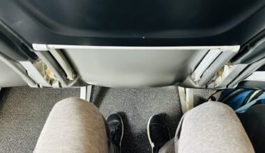 photo of a person's legroom on a plane