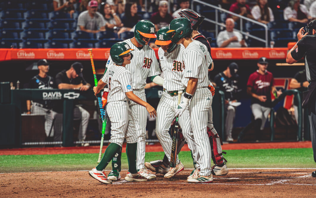 Miami scores five in the eighth, beat Troy 10-5 to open Gainesville Regional