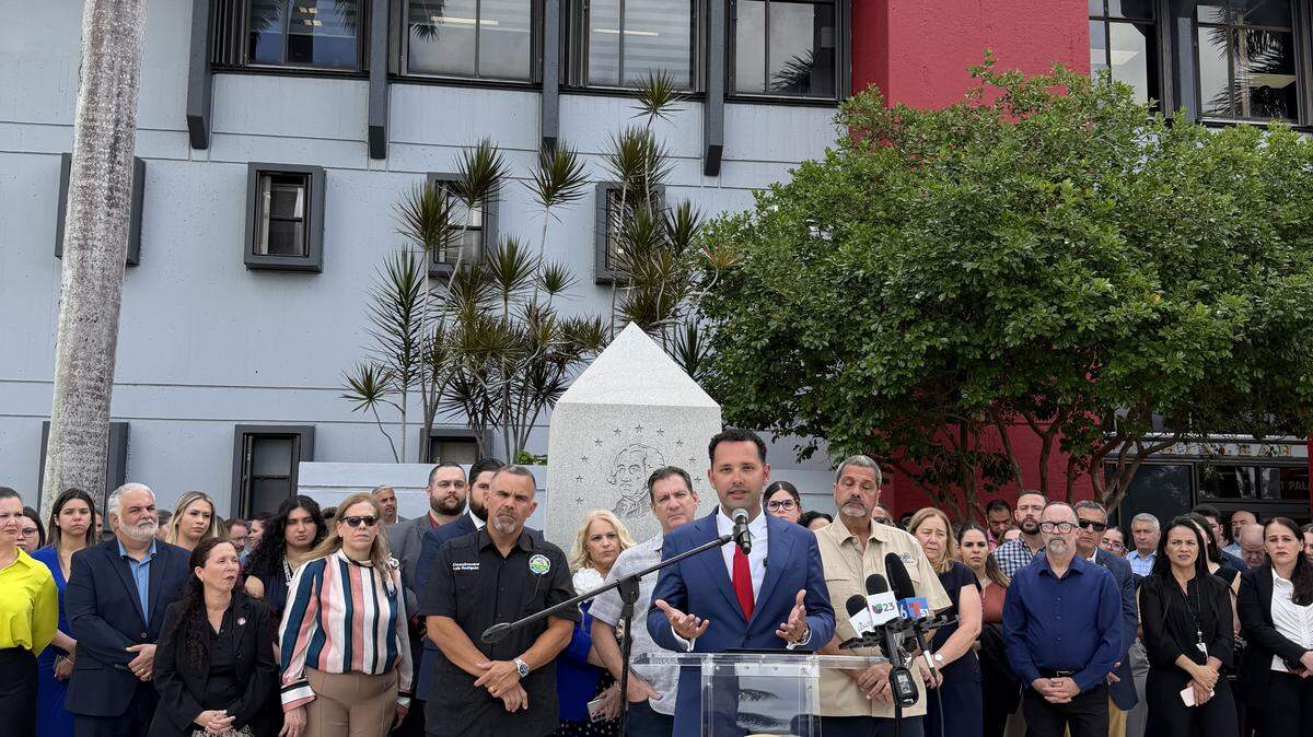Hialeah Mayor Bryan Calvo speaks at a press conference marking the first 100 days of his administration, with Council President Carl Zogby on his left, Councilman Luis Gonzalez behind, and Councilman Luis Rodriguez on his right, alongside city employees Hialeah Mayor Bryan Calvo speaks at a press conference marking the first 100 days of his administration, with Council President Carl Zogby on his left, Councilman Luis Gonzalez behind, and Councilman Luis Rodriguez on his right, alongside city employees