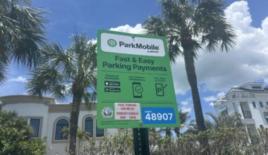 This is a picture of a ParkMobile sign at Indian Rocks Beach for visitors to pay to park.