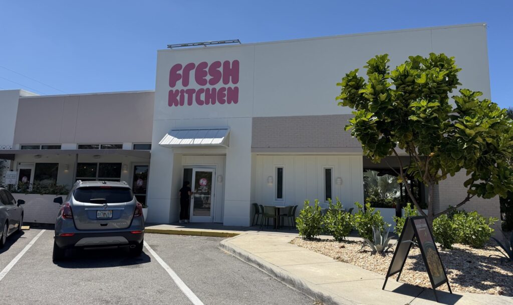 Exterior of Fresh Kitchen in St. Pete with its new bubble lettering and white paint.